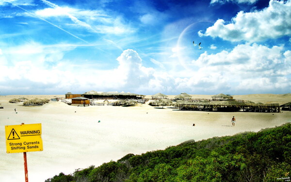 美丽的蓝天白云沙滩风景图片