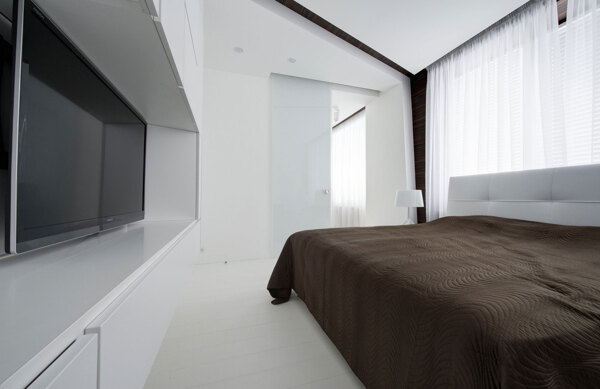 现代极简卧室白色背景墙室内装修效果图
