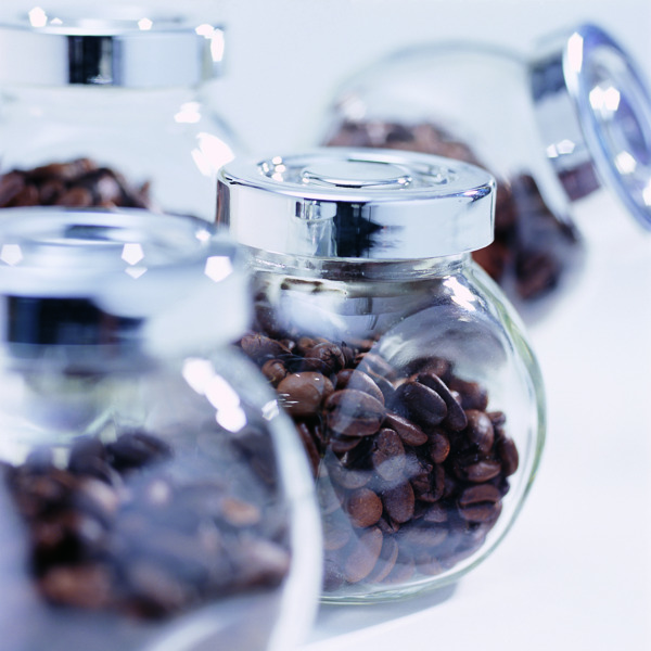 玻璃罐子里的咖啡豆摄影图片