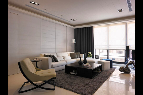 现代简约客厅深色地毯室内装修效果图