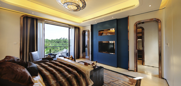 现代简约卧室深蓝色背景墙室内装修效果图
