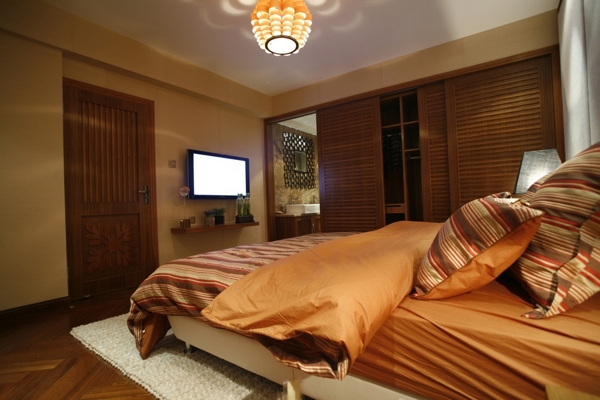 现代时尚卧室金褐色床品室内装修效果图