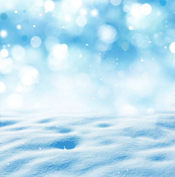 梦幻光斑与雪地背景图片