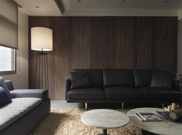 现代质感客厅黑色皮质沙发室内装修效果图